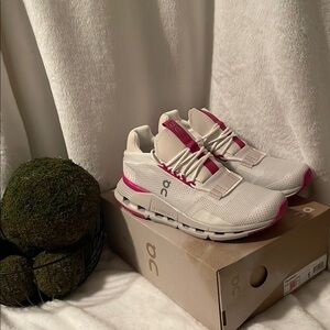 On Running White and Pink Sneakers